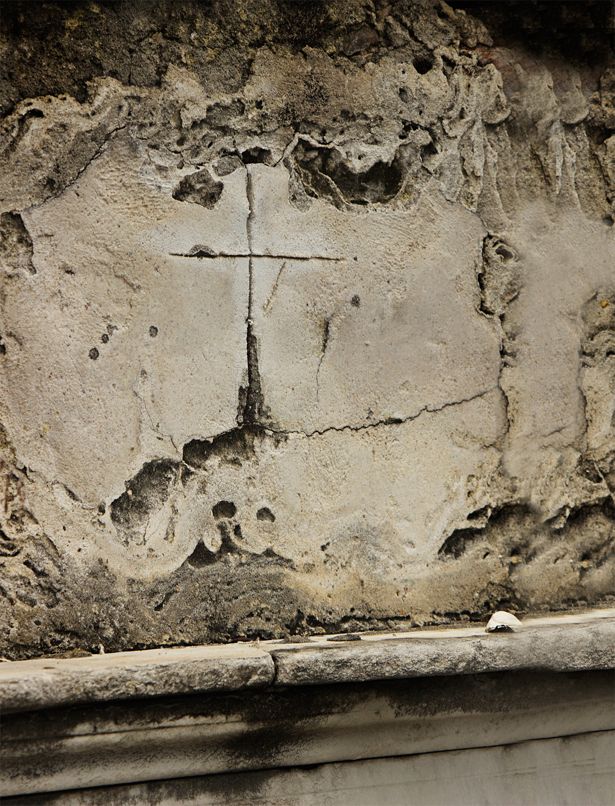 creepy stone cross in graveyard -photo by Quiet Lion Creations